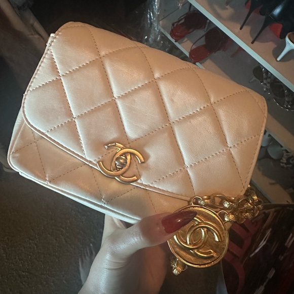 CHANEL Handbags - CHANEL white mini quilted flap with gold chain